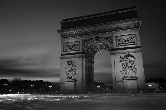 Arc de Triomphe in Paris at night with light trails