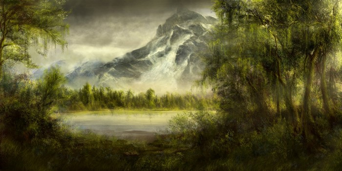 Misty mountain landscape with a lake and forest