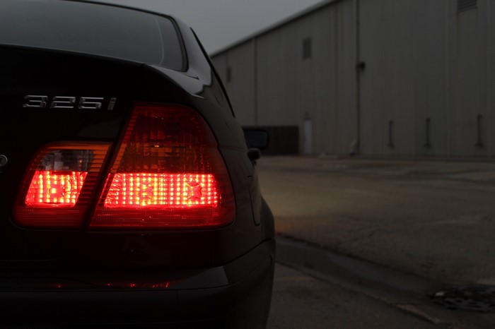 BMW 325i taillights at dusk