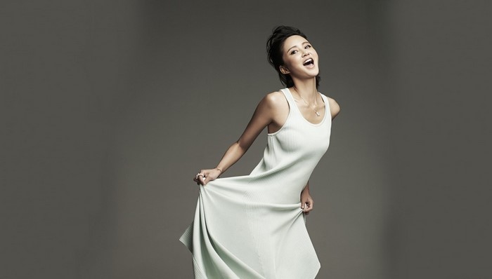 Zhang Xinyi in a light blue dress