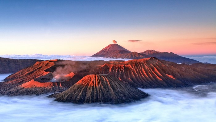 Mount Bromo volcano landscape at sunrise with mist