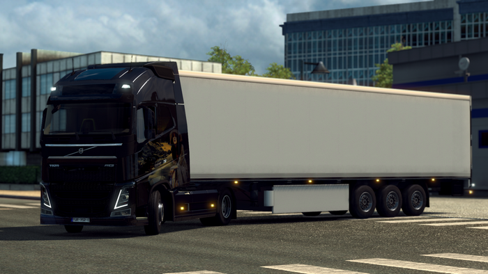 Black Volvo FH16 Truck with Trailer