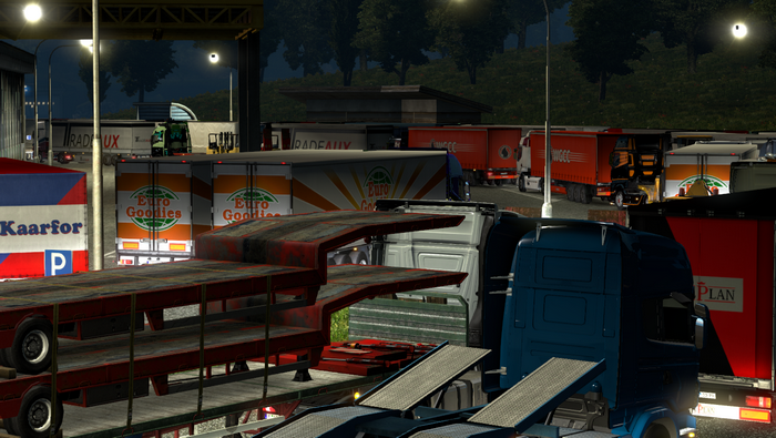 Euro Truck Simulator 2 trucks parked at night