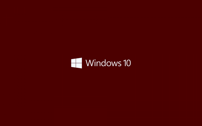 Windows 10 logo on a dark red background