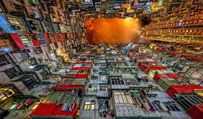 Apartment buildings looking up at a nebula