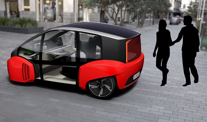 Rinspeed Oasis concept car with solar panels on city street