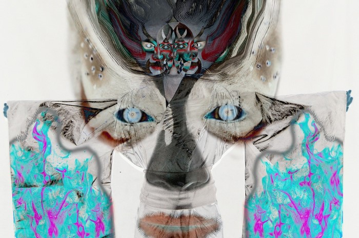 Abstract face with colorful patterns and eyes