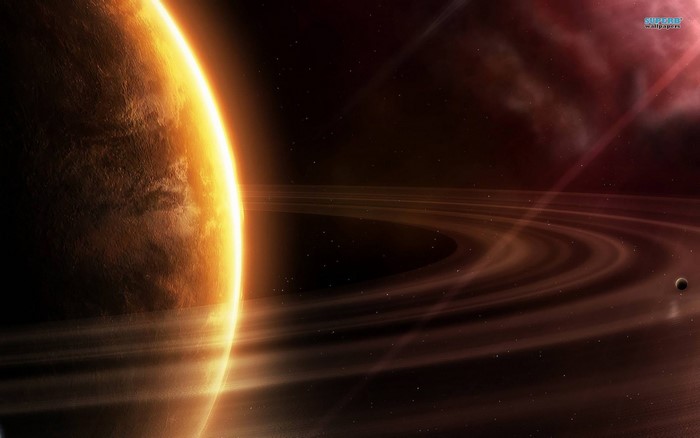 Planet with rings and nebula in space
