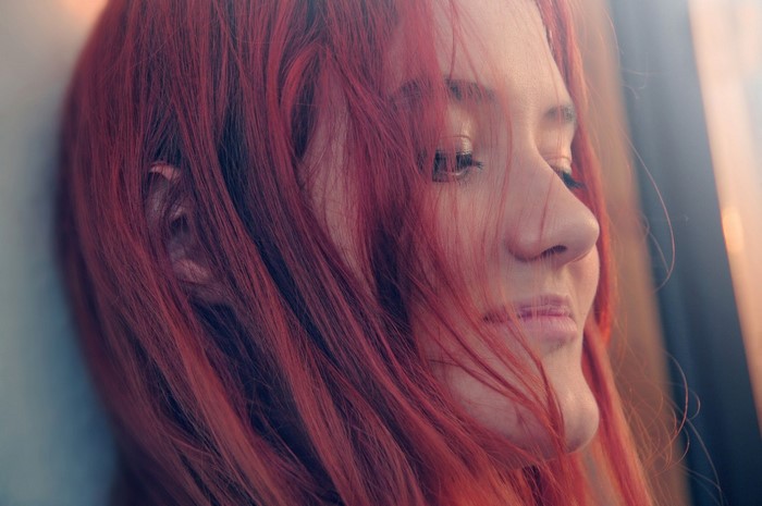 Close up portrait of a woman with red hair