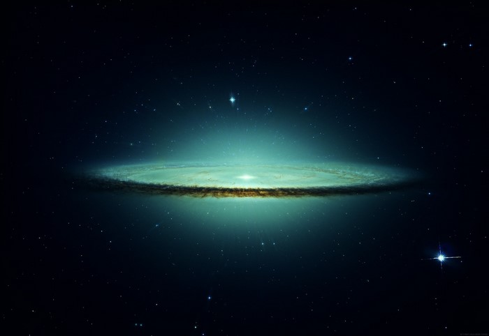 A glowing galaxy in deep space with stars