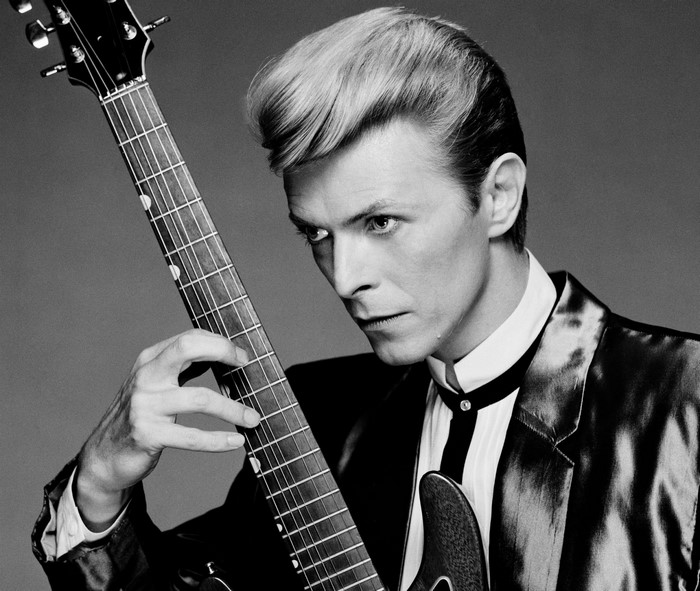 David Bowie with a guitar