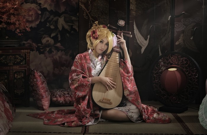 Woman in Kimono Playing a Lute