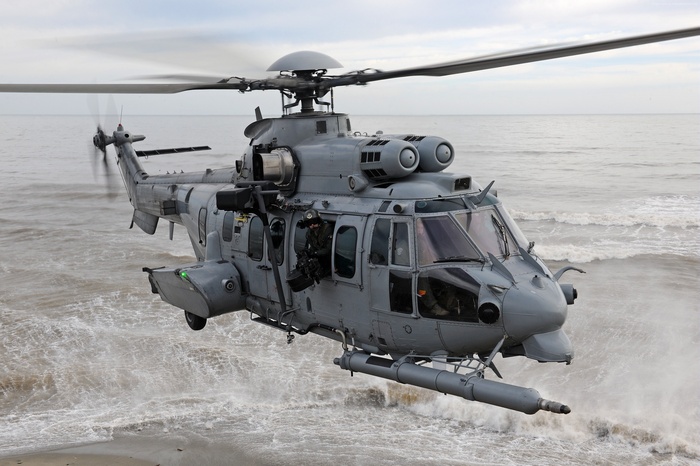 French Air Force Airbus H225M helicopter over the ocean