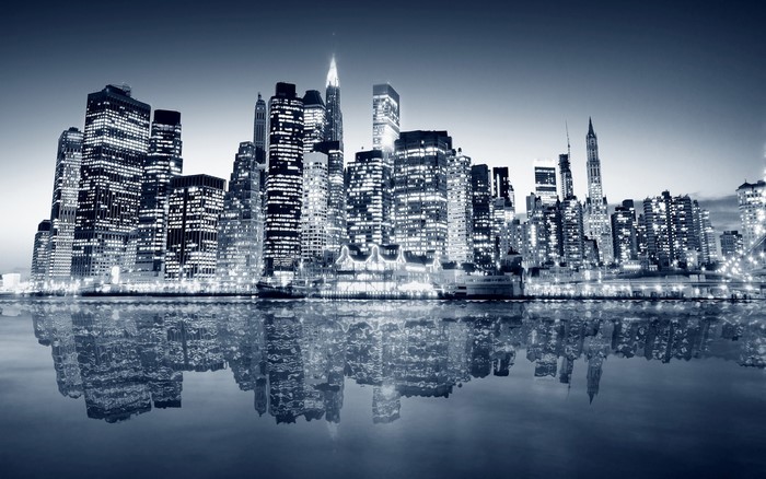 Monochrome New York City Skyline at Night with Water Reflection