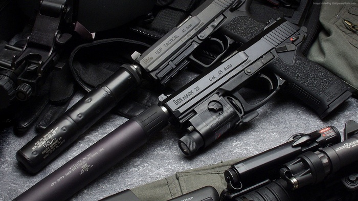 Heckler & Koch USP Tactical and Mark 23 pistols with silencers