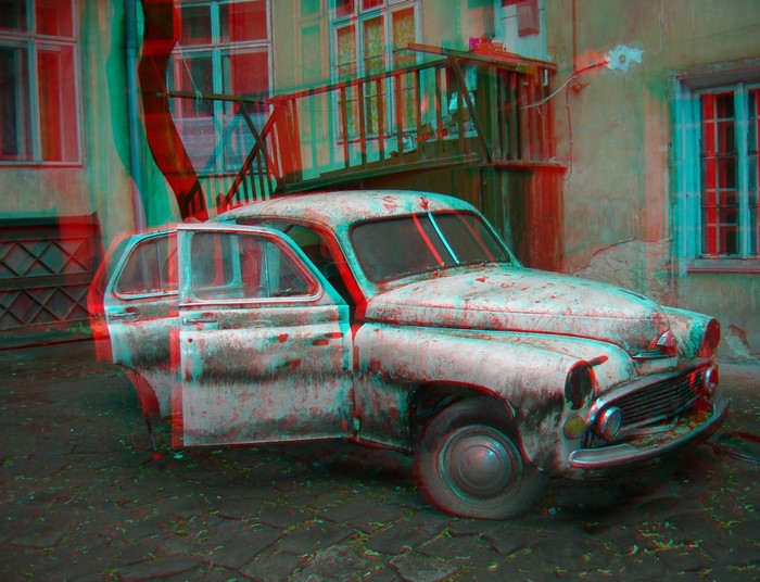 Anaglyph 3D image of a rusty old car
