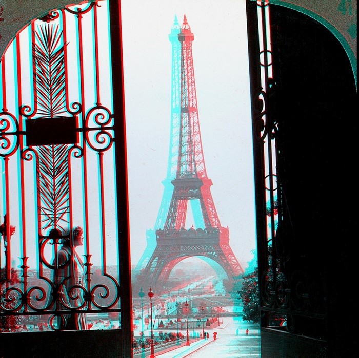 Eiffel Tower viewed through ornate gates