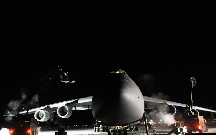 Lockheed C-5 Galaxy aircraft on a cold, dark night
