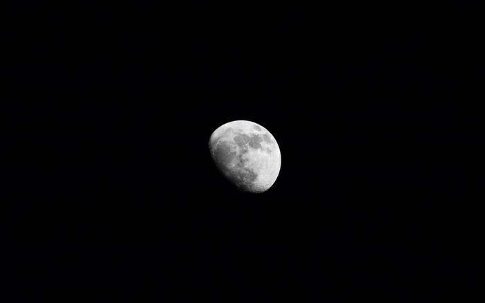 Monochrome photography of the Moon in space