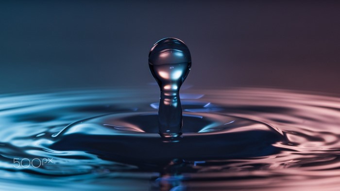 Close-up macro photography of a water drop splashing