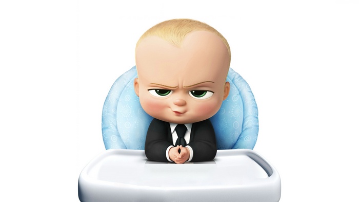 The Boss Baby sitting in a high chair
