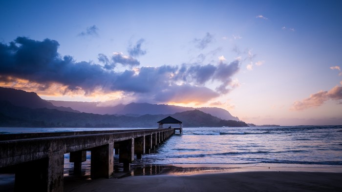 Pier with Gazebo at Sunset over the Ocean