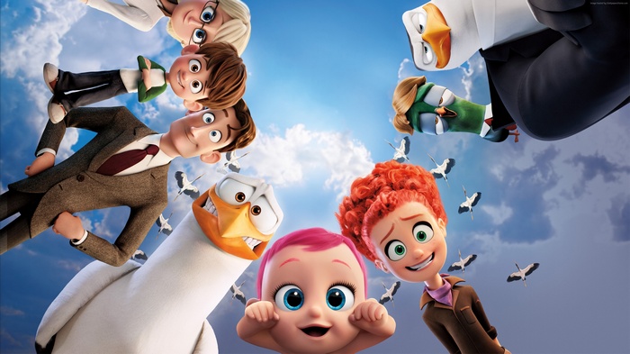 Storks characters and a baby with cranes in the sky