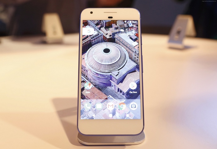 Google Pixel smartphone with aerial view wallpaper