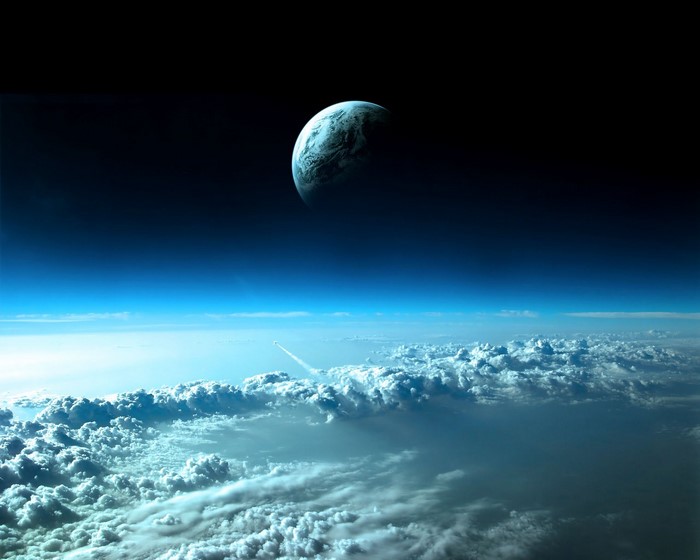 Planet Earth from space with clouds and a rocket