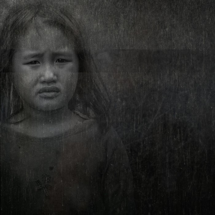 Monochrome portrait of a sad young girl