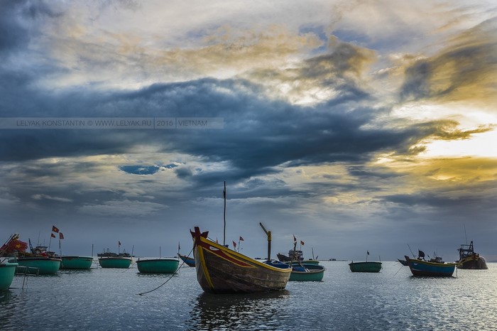 Boats in the sea at sunset in Vietnam