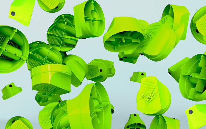 Scattered green spray paint caps with 'DELICE' logo