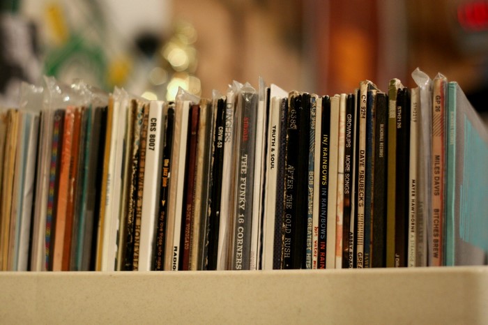 Record album covers on a shelf