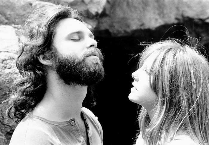 Jim Morrison and a woman in black and white portrait