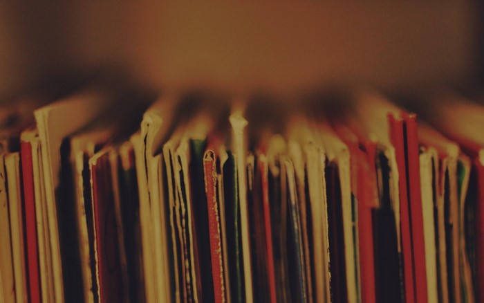 Close up of vinyl record album covers on a shelf