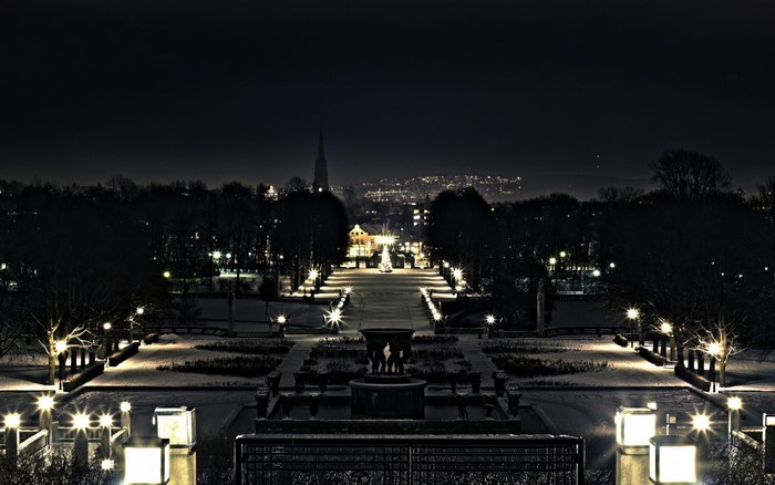 Cityscape at night with park and lights