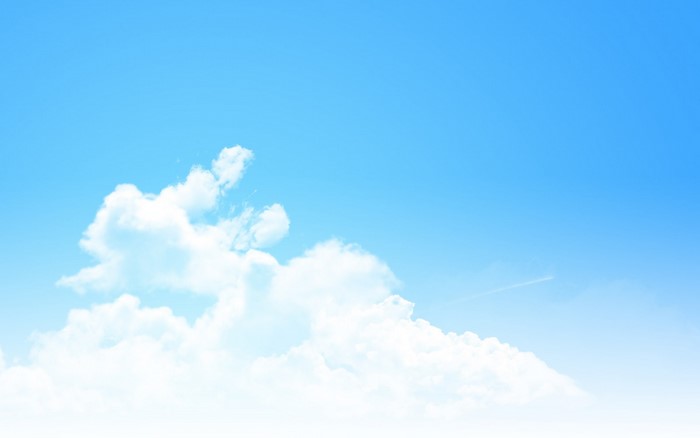 Blue sky with white cumulus clouds