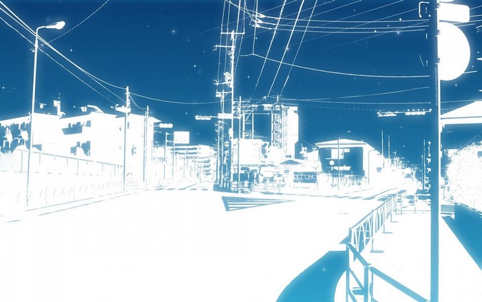 Street scene with power lines at night