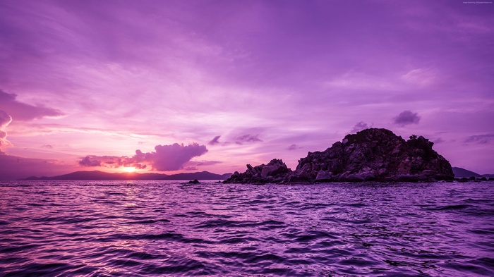 Purple sunset over the ocean with Pelican Island