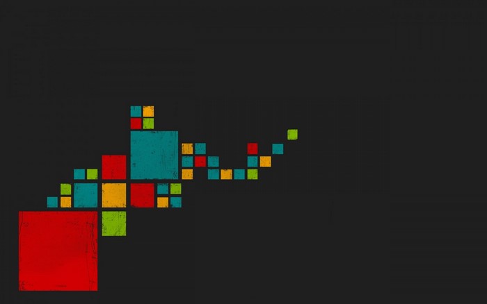 Abstract geometric shapes in red, blue, yellow, and green