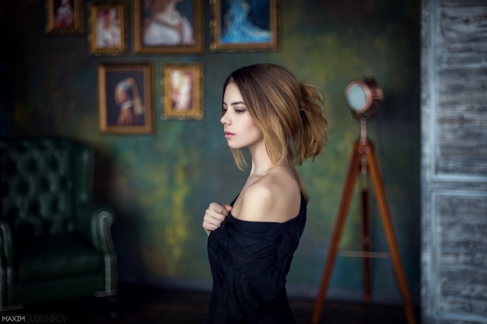 Woman with long hair in a black dress