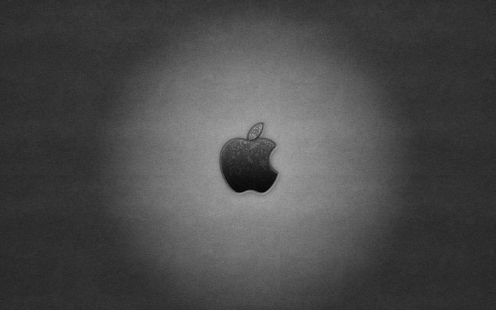 Apple logo on a textured gray background