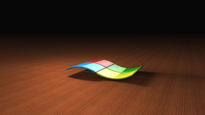 Microsoft Windows logo on a wooden surface