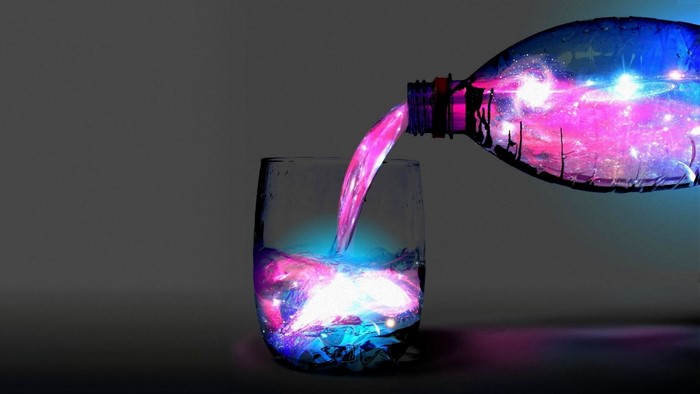 Galaxy poured from bottle into glass
