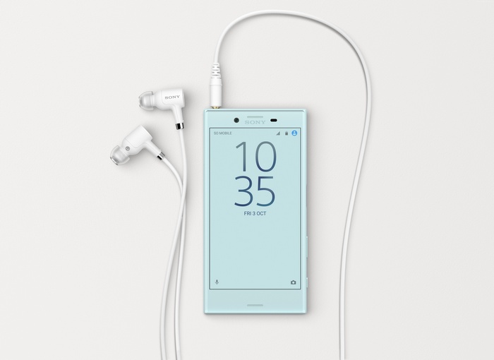 Sony Xperia X Compact with white earbuds
