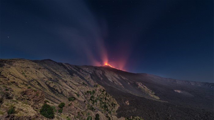 Mount Etna eruption at night, Valle del Bove landscape
