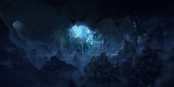 Dark cave with glowing blue light and rocky formations