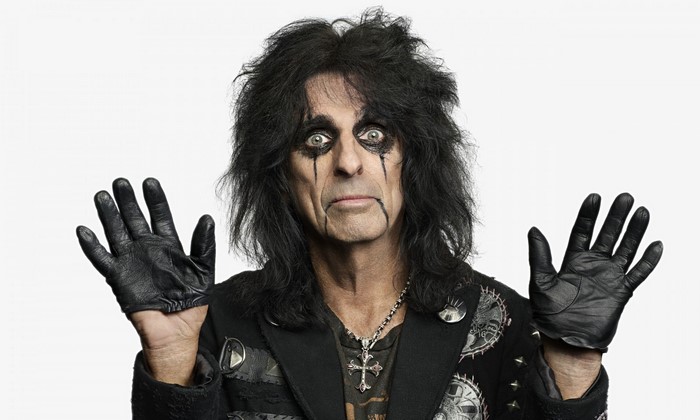 Alice Cooper wearing makeup and gloves