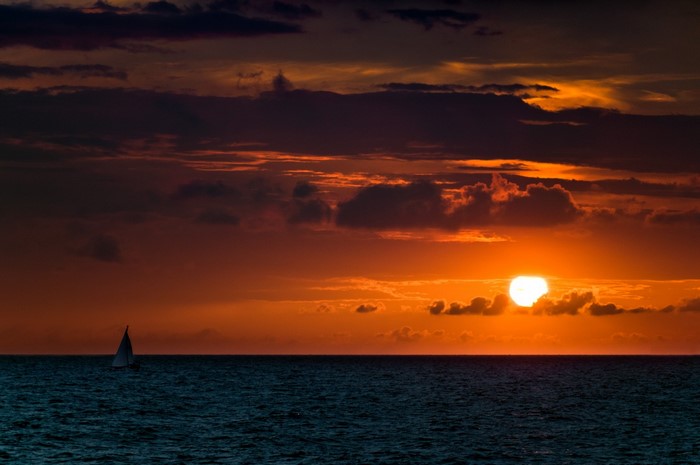 Sailboat on the sea during sunset