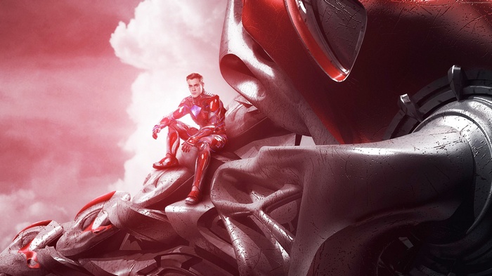 Jason Lee Scott from Power Rangers sitting on a giant robot